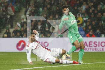 2021-10-03 - Houssem AOUAR of Lyon and Mahdi CAMARA of Saint Etienne during the French championship Ligue 1 football match between AS Saint-Etienne and Olympique Lyonnais on October 3, 2021 at Geoffroy Guichard stadium in Saint-Etienne, France - AS SAINT-ETIENNE VS OLYMPIQUE LYONNAIS - FRENCH LIGUE 1 - SOCCER