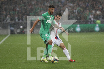 2021-10-03 - Denis BOUANGA of Saint Etienne and Leo DUBOIS of Lyon during the French championship Ligue 1 football match between AS Saint-Etienne and Olympique Lyonnais on October 3, 2021 at Geoffroy Guichard stadium in Saint-Etienne, France - AS SAINT-ETIENNE VS OLYMPIQUE LYONNAIS - FRENCH LIGUE 1 - SOCCER
