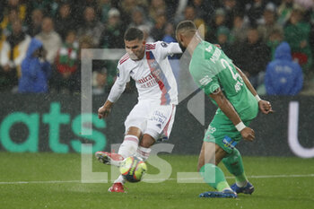 2021-10-03 - Houssem AOUAR of Lyon score a goal and Harold MOUKOUDI of Saint Etienne during the French championship Ligue 1 football match between AS Saint-Etienne and Olympique Lyonnais on October 3, 2021 at Geoffroy Guichard stadium in Saint-Etienne, France - AS SAINT-ETIENNE VS OLYMPIQUE LYONNAIS - FRENCH LIGUE 1 - SOCCER