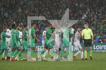 2021-10-03 - Referee Francois LETEXIER and Leo DUBOIS of Lyon and Jerome BOATENG of Lyon and Ryad BOUDEBOUZ of Saint Etienne during the French championship Ligue 1 football match between AS Saint-Etienne and Olympique Lyonnais on October 3, 2021 at Geoffroy Guichard stadium in Saint-Etienne, France - AS SAINT-ETIENNE VS OLYMPIQUE LYONNAIS - FRENCH LIGUE 1 - SOCCER