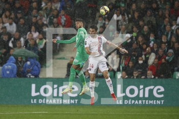 2021-10-03 - Leo DUBOIS of Lyon and Denis BOUANGA of Saint Etienne during the French championship Ligue 1 football match between AS Saint-Etienne and Olympique Lyonnais on October 3, 2021 at Geoffroy Guichard stadium in Saint-Etienne, France - AS SAINT-ETIENNE VS OLYMPIQUE LYONNAIS - FRENCH LIGUE 1 - SOCCER