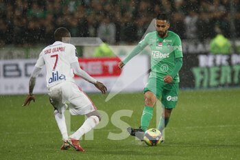 2021-10-03 - Ryad BOUDEBOUZ of Saint Etienne and Karl TOKO EKAMBI of Lyon during the French championship Ligue 1 football match between AS Saint-Etienne and Olympique Lyonnais on October 3, 2021 at Geoffroy Guichard stadium in Saint-Etienne, France - AS SAINT-ETIENNE VS OLYMPIQUE LYONNAIS - FRENCH LIGUE 1 - SOCCER