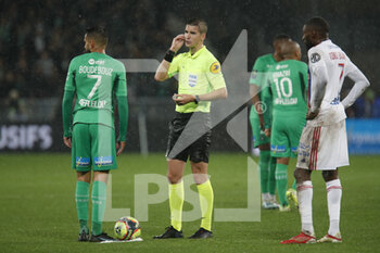 2021-10-03 - Referee Francois LETEXIER and Ryad BOUDEBOUZ of Saint Etienne and Karl TOKO EKAMBI of Lyon during the French championship Ligue 1 football match between AS Saint-Etienne and Olympique Lyonnais on October 3, 2021 at Geoffroy Guichard stadium in Saint-Etienne, France - AS SAINT-ETIENNE VS OLYMPIQUE LYONNAIS - FRENCH LIGUE 1 - SOCCER
