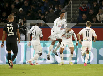 2021-10-15 - Angelo Fulgini of Angers celebrates his goal with Sofiane Boufal and teammates during the French championship Ligue 1 football match between Paris Saint-Germain (PSG) and SCO Angers on October 15, 2021 at Parc des Princes stadium in Paris, France - PARIS SAINT-GERMAIN VS SCO ANGERS - FRENCH LIGUE 1 - SOCCER