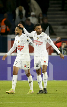 2021-10-15 - Angelo Fulgini of Angers celebrates his goal with Sofiane Boufal (left) during the French championship Ligue 1 football match between Paris Saint-Germain (PSG) and SCO Angers on October 15, 2021 at Parc des Princes stadium in Paris, France - PARIS SAINT-GERMAIN VS SCO ANGERS - FRENCH LIGUE 1 - SOCCER