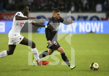 2021-10-15 - Marco Verratti of PSG, Batista Mendy of Angers (left) during the French championship Ligue 1 football match between Paris Saint-Germain (PSG) and SCO Angers on October 15, 2021 at Parc des Princes stadium in Paris, France - PARIS SAINT-GERMAIN VS SCO ANGERS - FRENCH LIGUE 1 - SOCCER