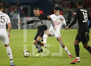 2021-10-15 - Marco Verratti of PSG, Azzeddine Ounahi of Angers during the French championship Ligue 1 football match between Paris Saint-Germain (PSG) and SCO Angers on October 15, 2021 at Parc des Princes stadium in Paris, France - PARIS SAINT-GERMAIN VS SCO ANGERS - FRENCH LIGUE 1 - SOCCER