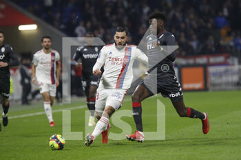 2021-10-16 - Rayan CHERKI of Lyon and Benoit BADIASHILE of Monaco during the French championship Ligue 1 football match between Olympique Lyonnais and AS Monaco on October 16, 2021 at Groupama stadium in Decines-Charpieu near Lyon, France - OLYMPIQUE LYONNAIS VS AS MONACO - FRENCH LIGUE 1 - SOCCER
