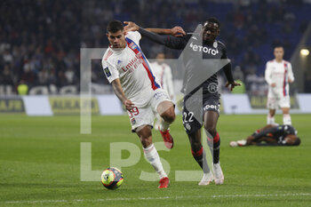 2021-10-16 - Bruno GUIMARAES of Lyon and Youssouf FOFANA of Monaco during the French championship Ligue 1 football match between Olympique Lyonnais and AS Monaco on October 16, 2021 at Groupama stadium in Decines-Charpieu near Lyon, France - OLYMPIQUE LYONNAIS VS AS MONACO - FRENCH LIGUE 1 - SOCCER