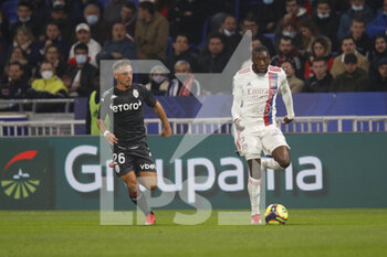 2021-10-16 - Karl Toko EKAMBI of Lyon and Ruben AGUILAR of Monaco during the French championship Ligue 1 football match between Olympique Lyonnais and AS Monaco on October 16, 2021 at Groupama stadium in Decines-Charpieu near Lyon, France - OLYMPIQUE LYONNAIS VS AS MONACO - FRENCH LIGUE 1 - SOCCER