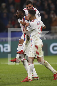 2021-10-16 - Karl Toko EKAMBI of Lyon celebrate the gaol and Houssem AOUAR of Lyon and Bruno GUIMARAES of Lyon during the French championship Ligue 1 football match between Olympique Lyonnais and AS Monaco on October 16, 2021 at Groupama stadium in Decines-Charpieu near Lyon, France - OLYMPIQUE LYONNAIS VS AS MONACO - FRENCH LIGUE 1 - SOCCER
