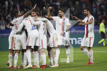 2021-10-16 - Karl Toko EKAMBI of Lyon celebrate the gaol and Emerson PALMIERI of Lyon and Lucas PAQUETA of Lyon and Leo DUBOIS of Lyon during the French championship Ligue 1 football match between Olympique Lyonnais and AS Monaco on October 16, 2021 at Groupama stadium in Decines-Charpieu near Lyon, France - OLYMPIQUE LYONNAIS VS AS MONACO - FRENCH LIGUE 1 - SOCCER