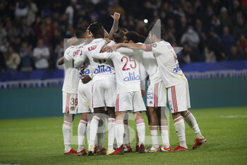 2021-10-16 - Karl Toko EKAMBI of Lyon celebrate the gaol and team of Lyon during the French championship Ligue 1 football match between Olympique Lyonnais and AS Monaco on October 16, 2021 at Groupama stadium in Decines-Charpieu near Lyon, France - OLYMPIQUE LYONNAIS VS AS MONACO - FRENCH LIGUE 1 - SOCCER