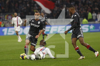 2021-10-16 - Tino KADEWERE of Lyon and Ruben AGUILAR of Monaco during the French championship Ligue 1 football match between Olympique Lyonnais and AS Monaco on October 16, 2021 at Groupama stadium in Decines-Charpieu near Lyon, France - OLYMPIQUE LYONNAIS VS AS MONACO - FRENCH LIGUE 1 - SOCCER
