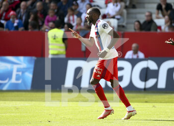 2021-10-24 - Karl Toko Ekembi of Lyon celebrates his goal during the French championship Ligue 1 football match between OGC Nice (OGCN) and Olympique Lyonnais (OL) on October 24, 2021 at Allianz Riviera stadium in Nice, France - OGC NICE (OGCN) VS OLYMPIQUE LYONNAIS (OL) - FRENCH LIGUE 1 - SOCCER
