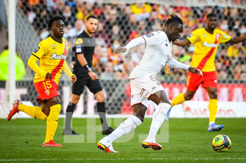 2021-10-24 - Arnaud KALIMUENDO of RC Lens and Kevin N'DORAM of Metz during the French championship Ligue 1 football match between RC Lens and FC Metz on October 24, 2021 at Bollaert-Delelis stadium in Lens, France - RC LENS VS FC METZ - FRENCH LIGUE 1 - SOCCER