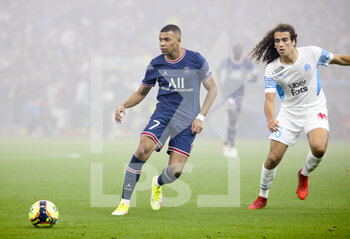 2021-10-24 - Kylian Mbappe of PSG, Matteo Guendouzi of Marseille during the French championship Ligue 1 football match between Olympique de Marseille (OM) and Paris Saint-Germain (PSG) on October 24, 2021 at Stade Velodrome in Marseille, France - OLYMPIQUE DE MARSEILLE (OM) VS PARIS SAINT-GERMAIN (PSG) - FRENCH LIGUE 1 - SOCCER
