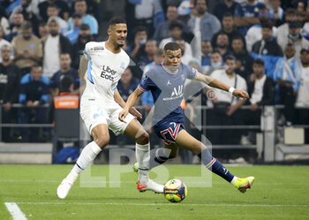2021-10-24 - Kylian Mbappe of PSG, William Saliba of Marseille (left) during the French championship Ligue 1 football match between Olympique de Marseille (OM) and Paris Saint-Germain (PSG) on October 24, 2021 at Stade Velodrome in Marseille, France - OLYMPIQUE DE MARSEILLE (OM) VS PARIS SAINT-GERMAIN (PSG) - FRENCH LIGUE 1 - SOCCER