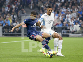 2021-10-24 - Kylian Mbappe of PSG, William Saliba of Marseille during the French championship Ligue 1 football match between Olympique de Marseille (OM) and Paris Saint-Germain (PSG) on October 24, 2021 at Stade Velodrome in Marseille, France - OLYMPIQUE DE MARSEILLE (OM) VS PARIS SAINT-GERMAIN (PSG) - FRENCH LIGUE 1 - SOCCER