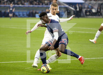 2021-10-24 - Nuno Mendes of PSG, Valentin Rongier of Marseille during the French championship Ligue 1 football match between Olympique de Marseille (OM) and Paris Saint-Germain (PSG) on October 24, 2021 at Stade Velodrome in Marseille, France - OLYMPIQUE DE MARSEILLE (OM) VS PARIS SAINT-GERMAIN (PSG) - FRENCH LIGUE 1 - SOCCER