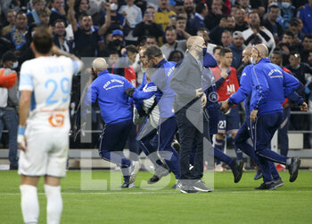 2021-10-24 - A pitch invader is removed by security during the French championship Ligue 1 football match between Olympique de Marseille (OM) and Paris Saint-Germain (PSG) on October 24, 2021 at Stade Velodrome in Marseille, France - OLYMPIQUE DE MARSEILLE (OM) VS PARIS SAINT-GERMAIN (PSG) - FRENCH LIGUE 1 - SOCCER