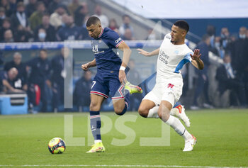 2021-10-24 - Kylian Mbappe of PSG, William Saliba of Marseille during the French championship Ligue 1 football match between Olympique de Marseille (OM) and Paris Saint-Germain (PSG) on October 24, 2021 at Stade Velodrome in Marseille, France - OLYMPIQUE DE MARSEILLE (OM) VS PARIS SAINT-GERMAIN (PSG) - FRENCH LIGUE 1 - SOCCER