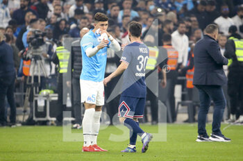 2021-10-24 - Leonardo Balerdi of Marseille asking Lionel Messi of PSG his jersey following the French championship Ligue 1 football match between Olympique de Marseille (OM) and Paris Saint-Germain (PSG) on October 24, 2021 at Stade Velodrome in Marseille, France - OLYMPIQUE DE MARSEILLE (OM) VS PARIS SAINT-GERMAIN (PSG) - FRENCH LIGUE 1 - SOCCER