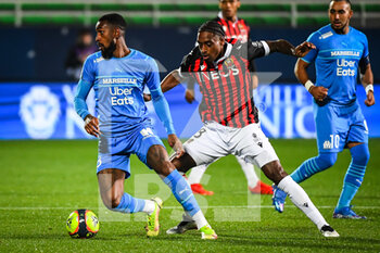 2021-10-27 - Jordan AMAVI of Marseille and Cristian Pablo PAULINO ROSARIO of Nice during the French championship Ligue 1 football match between OGC Nice and Olympique de Marseille on October 27, 2021 at Stade de l'Aube in Troyes, France - OGC NICE VS OLYMPIQUE DE MARSEILLE - FRENCH LIGUE 1 - SOCCER