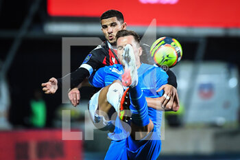 2021-10-27 - Youcef ATAL of Nice and Arkadiusz MILIK of Marseille during the French championship Ligue 1 football match between OGC Nice and Olympique de Marseille on October 27, 2021 at Stade de l'Aube in Troyes, France - OGC NICE VS OLYMPIQUE DE MARSEILLE - FRENCH LIGUE 1 - SOCCER