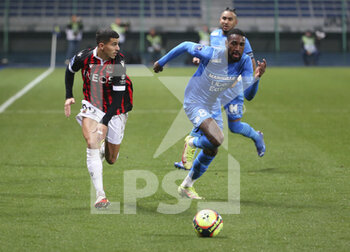2021-10-27 - Youcef Atal of Nice, Gerson of Marseille during the French championship Ligue 1 football match between OGC Nice (OGCN) and Olympique de Marseille (OM) on October 27, 2021 at Stade de l'Aube in Troyes, France - OGC NICE VS OLYMPIQUE DE MARSEILLE - FRENCH LIGUE 1 - SOCCER
