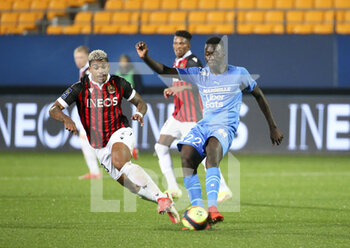 2021-10-27 - Pape Gueye of Marseille, Mario Lemina of Nice (left) during the French championship Ligue 1 football match between OGC Nice (OGCN) and Olympique de Marseille (OM) on October 27, 2021 at Stade de l'Aube in Troyes, France - OGC NICE VS OLYMPIQUE DE MARSEILLE - FRENCH LIGUE 1 - SOCCER