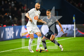 2021-10-29 - Burak YILMAZ of Lille and Thilo KEHRER of PSG during the French championship Ligue 1 football match between Paris Saint-Germain and LOSC Lille on October 29, 2021 at Parc des Princes stadium in Paris, France - PARIS SAINT-GERMAIN VS LOSC LILLE - FRENCH LIGUE 1 - SOCCER