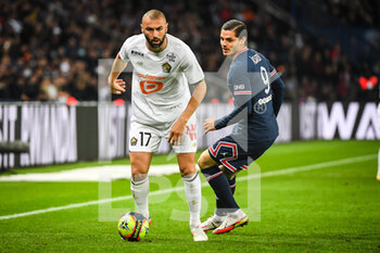 2021-10-29 - Burak YILMAZ of Lille and Mauro ICARDI of PSG during the French championship Ligue 1 football match between Paris Saint-Germain and LOSC Lille on October 29, 2021 at Parc des Princes stadium in Paris, France - PARIS SAINT-GERMAIN VS LOSC LILLE - FRENCH LIGUE 1 - SOCCER