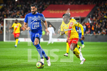 2021-11-05 - Adil RAMI of ESTAC Troyes and Arnaud KALIMUENDO of Lens during the French championship Ligue 1 football match between RC Lens and ESTAC Troyes on November 5, 2021 at Bollaert-Delelis stadium in Lens, France - RC LENS VS ESTAC TROYES - FRENCH LIGUE 1 - SOCCER