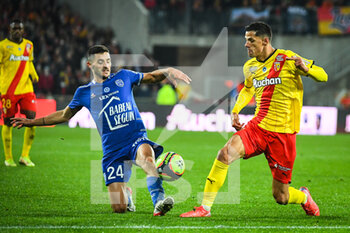 2021-11-05 - Xavier CHAVALERIN of ESTAC Troyes and Florian SOTOCA of Lens during the French championship Ligue 1 football match between RC Lens and ESTAC Troyes on November 5, 2021 at Bollaert-Delelis stadium in Lens, France - RC LENS VS ESTAC TROYES - FRENCH LIGUE 1 - SOCCER