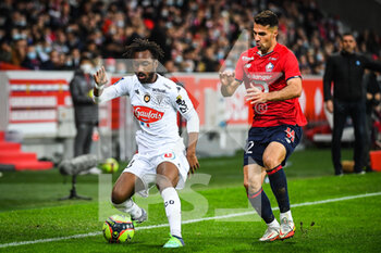 2021-11-06 - Souleyman DOUMBIA of Angers and Zeki CELIK of Lille during the French championship Ligue 1 football match between LOSC Lille and SCO Angers on November 6, 2021 at Pierre Mauroy stadium in Villeneuve-d'Ascq near Lille, France - LOSC LILLE VS SCO ANGERS - FRENCH LIGUE 1 - SOCCER