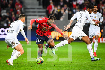 2021-11-06 - Renato SANCHES of Lille and Souleyman DOUMBIA of Angers during the French championship Ligue 1 football match between LOSC Lille and SCO Angers on November 6, 2021 at Pierre Mauroy stadium in Villeneuve-d'Ascq near Lille, France - LOSC LILLE VS SCO ANGERS - FRENCH LIGUE 1 - SOCCER