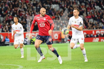 2021-11-06 - Burak YILMAZ 17 LOSC during the French championship Ligue 1 football match between LOSC Lille and SCO Angers on November 6, 2021 at Pierre Mauroy stadium in Villeneuve-d'Ascq near Lille, France - LOSC LILLE VS SCO ANGERS - FRENCH LIGUE 1 - SOCCER