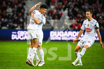 2021-11-06 - Azzedine OUNAHI of Angers celebrate his goal with Romain THOMAS of Angers during the French championship Ligue 1 football match between LOSC Lille and SCO Angers on November 6, 2021 at Pierre Mauroy stadium in Villeneuve-d'Ascq near Lille, France - LOSC LILLE VS SCO ANGERS - FRENCH LIGUE 1 - SOCCER