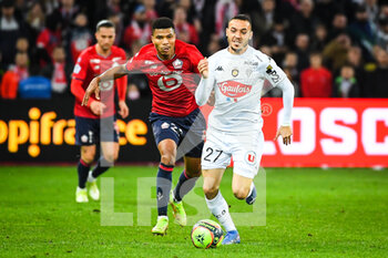 2021-11-06 - REINILDO of Lille and Mathias PEREIRA LAGE of Angers during the French championship Ligue 1 football match between LOSC Lille and SCO Angers on November 6, 2021 at Pierre Mauroy stadium in Villeneuve-d'Ascq near Lille, France - LOSC LILLE VS SCO ANGERS - FRENCH LIGUE 1 - SOCCER