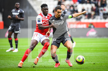 2021-11-07 - Azor MATUSIWA of Reims and Wissam BEN YEDDER of Monaco during the French championship Ligue 1 football match between Stade de Reims and AS Monaco on November 7, 2021 at Auguste Delaune stadium in Reims, France - STADE DE REIMS VS AS MONACO - FRENCH LIGUE 1 - SOCCER