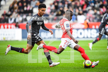 2021-11-07 - Sofiane DIOP of Monaco and Moreto CASSAMA of Reims during the French championship Ligue 1 football match between Stade de Reims and AS Monaco on November 7, 2021 at Auguste Delaune stadium in Reims, France - STADE DE REIMS VS AS MONACO - FRENCH LIGUE 1 - SOCCER