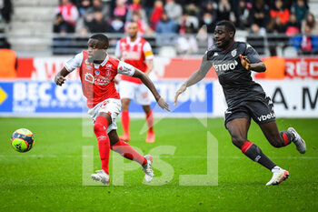 2021-11-07 - Moreto CASSAMA of Reims and Youssouf FOFANA of Monaco during the French championship Ligue 1 football match between Stade de Reims and AS Monaco on November 7, 2021 at Auguste Delaune stadium in Reims, France - STADE DE REIMS VS AS MONACO - FRENCH LIGUE 1 - SOCCER