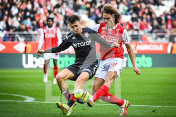 2021-11-07 - Aleksandr GOLOVIN of Monaco and Wout FAES of Reims during the French championship Ligue 1 football match between Stade de Reims and AS Monaco on November 7, 2021 at Auguste Delaune stadium in Reims, France - STADE DE REIMS VS AS MONACO - FRENCH LIGUE 1 - SOCCER