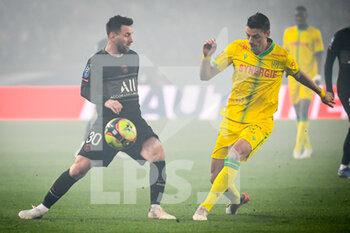 2021-11-20 - Lionel (Leo) MESSI of PSG and Andrei GIROTTO of Nantes during the French championship Ligue 1 football match between Paris Saint-Germain and FC Nantes on November 20, 2021 at Parc des Princes stadium in Paris, France - PARIS SAINT-GERMAIN VS FC NANTES - FRENCH LIGUE 1 - SOCCER