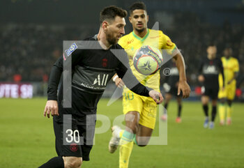 2021-11-20 - Lionel Messi of PSG, Ludovic Blas of Nantes during the French championship Ligue 1 football match between Paris Saint-Germain and FC Nantes on November 20, 2021 at Parc des Princes stadium in Paris, France - PARIS SAINT-GERMAIN VS FC NANTES - FRENCH LIGUE 1 - SOCCER