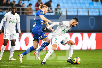 2021-11-21 - Renaud RIPART of ESTAC Troyes and Ryad BOUDEBOUZ of Saint Etienne during the French championship Ligue 1 football match between ESTAC Troyes and AS Saint-Etienne on November 21, 2021 at Stade de l'Aube in Troyes, France - ESTAC TROYES VS AS SAINT-ETIENNE - FRENCH LIGUE 1 - SOCCER