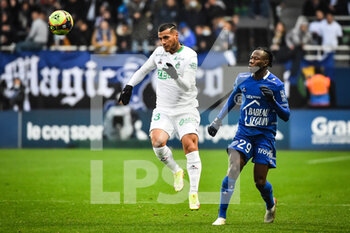 2021-11-21 - Miguel TRAUCO of Saint Etienne and Issa KABORE of Troyes during the French championship Ligue 1 football match between ESTAC Troyes and AS Saint-Etienne on November 21, 2021 at Stade de l'Aube in Troyes, France - ESTAC TROYES VS AS SAINT-ETIENNE - FRENCH LIGUE 1 - SOCCER