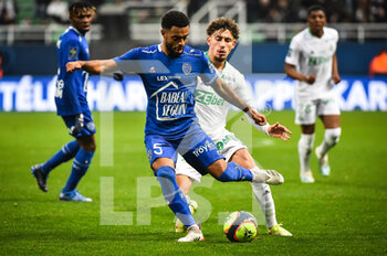 2021-11-21 - Tristan DINGOME of ESTAC Troyes and Adil AOUCHICHE of Saint Etienne during the French championship Ligue 1 football match between ESTAC Troyes and AS Saint-Etienne on November 21, 2021 at Stade de l'Aube in Troyes, France - ESTAC TROYES VS AS SAINT-ETIENNE - FRENCH LIGUE 1 - SOCCER
