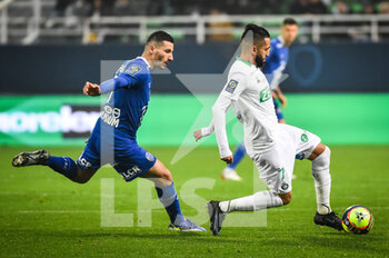 2021-11-21 - Yoann TOUZGHAR of ESTAC Troyes and Ryad BOUDEBOUZ of Saint Etienne during the French championship Ligue 1 football match between ESTAC Troyes and AS Saint-Etienne on November 21, 2021 at Stade de l'Aube in Troyes, France - ESTAC TROYES VS AS SAINT-ETIENNE - FRENCH LIGUE 1 - SOCCER